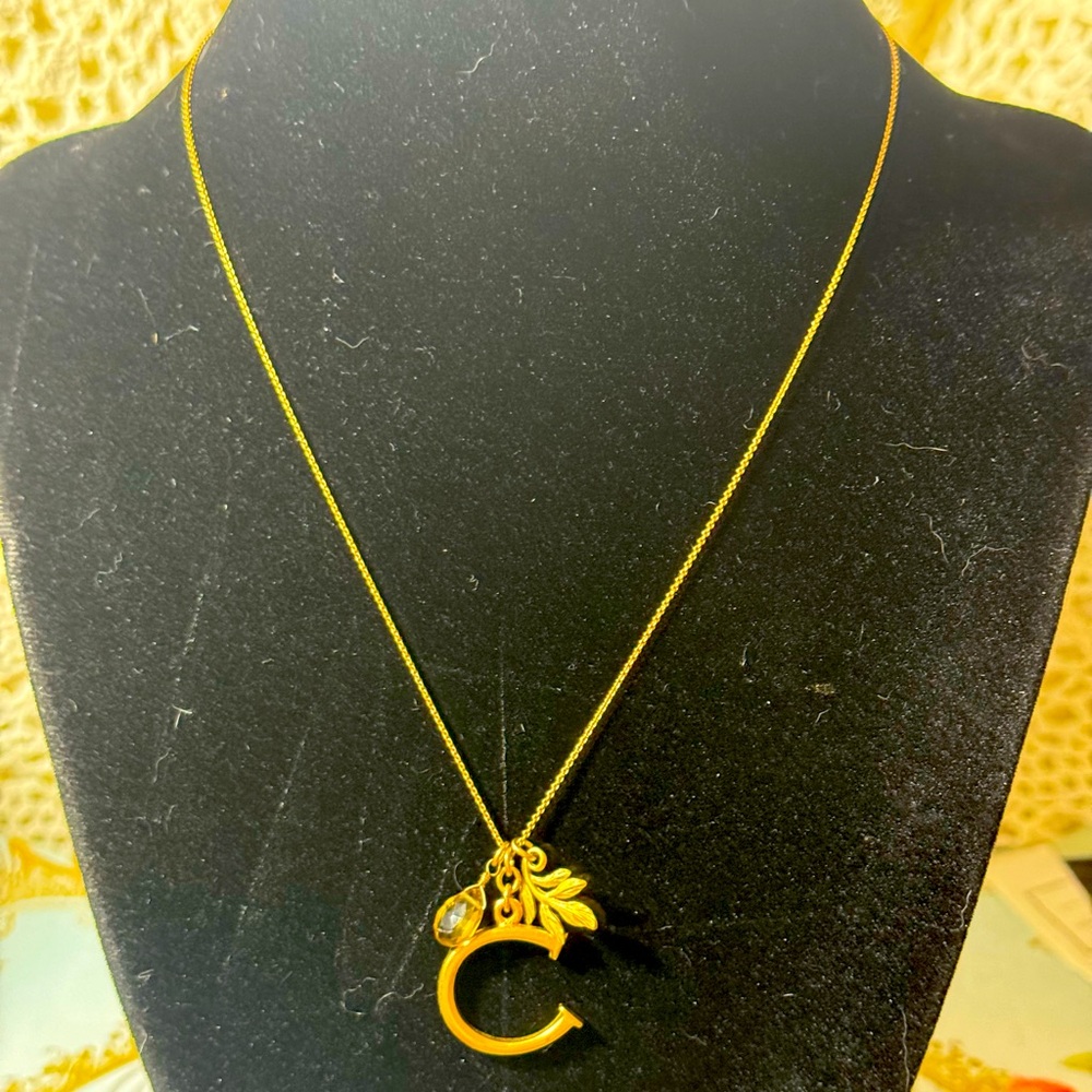 David Aubrey C dainty necklace gold tone crystal and leaf pattern around the C